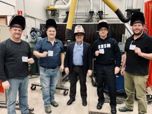4 men showing thier tickets
