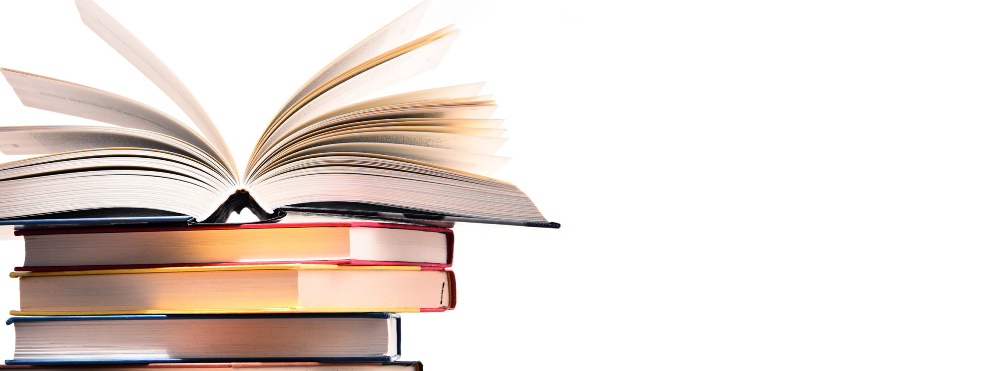 Composition with stack of books isolated on white.