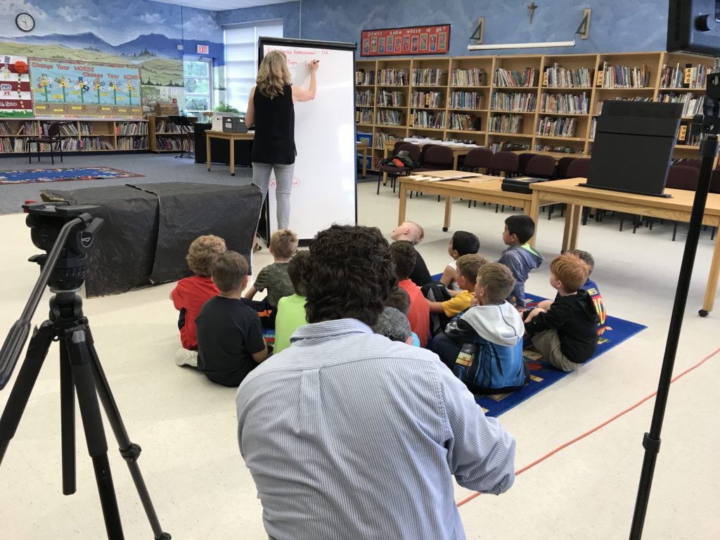 students listening to Bat habitat presentation