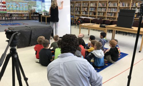 students listening to Bat habitat presentation