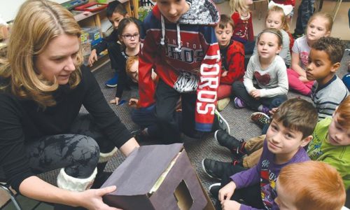 students listening to Bat habitat presentation