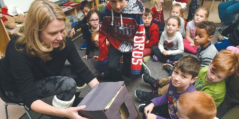 students listening to Bat habitat presentation