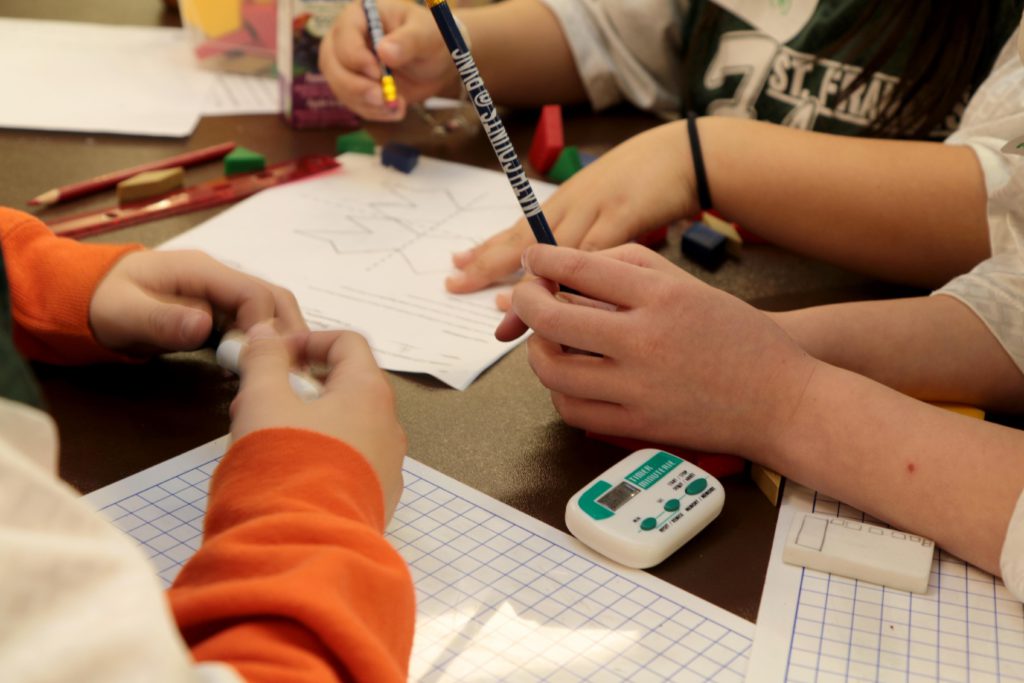 students working at math olympics