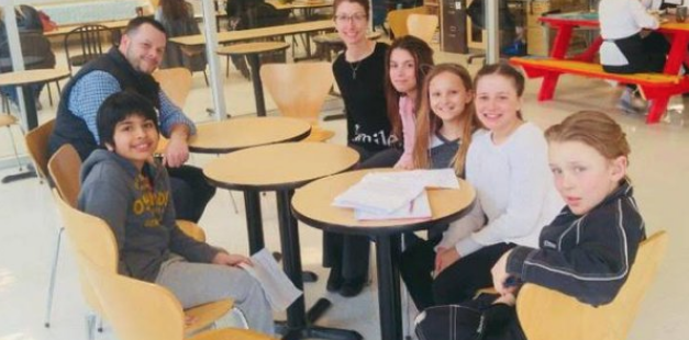 student sitting at tables