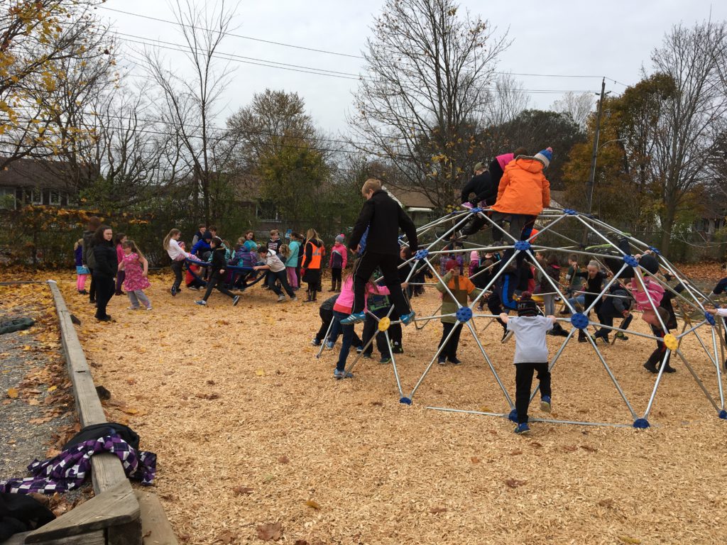 student playing in new playground