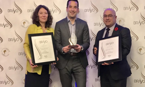 PVNC staff members holding awards