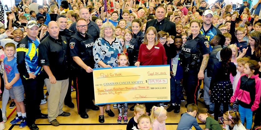 Pedal for Hope Cheque presentation to Holy Family Catholic Elementary School in Bowmanville