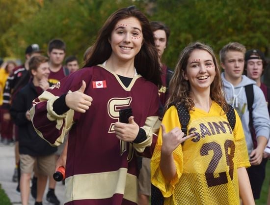 St. Peter and Holy Cross students participate in a Terry Fox Run event on Thursday (Oct. 11). Students from both schools met at Weller Street and Medical Drive and walked around the St. Peter community before gathering for a senior boys football game. - Lance Anderson/Metroland