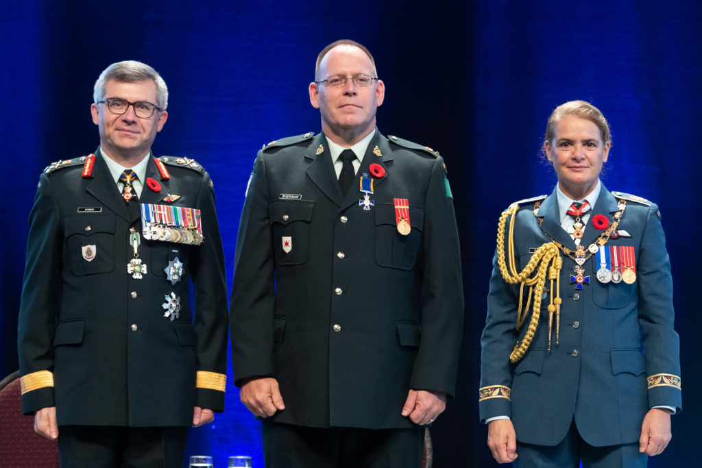 three people in military dress