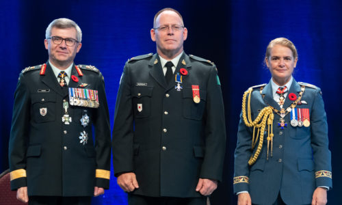 three people in military dress