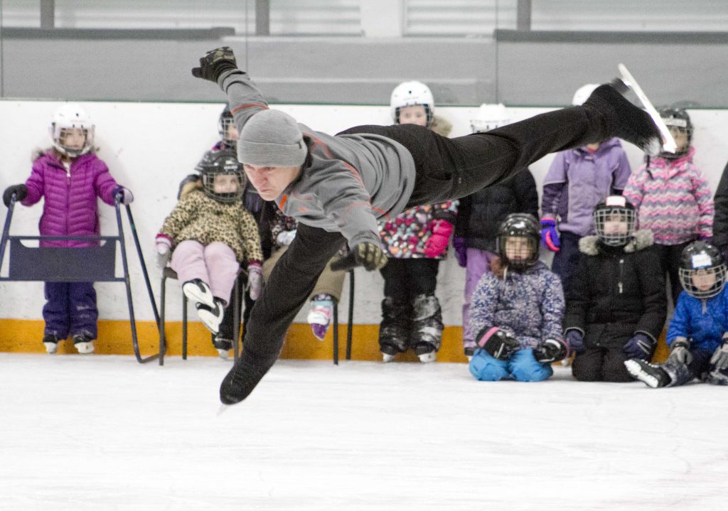 man performing a spin jump
