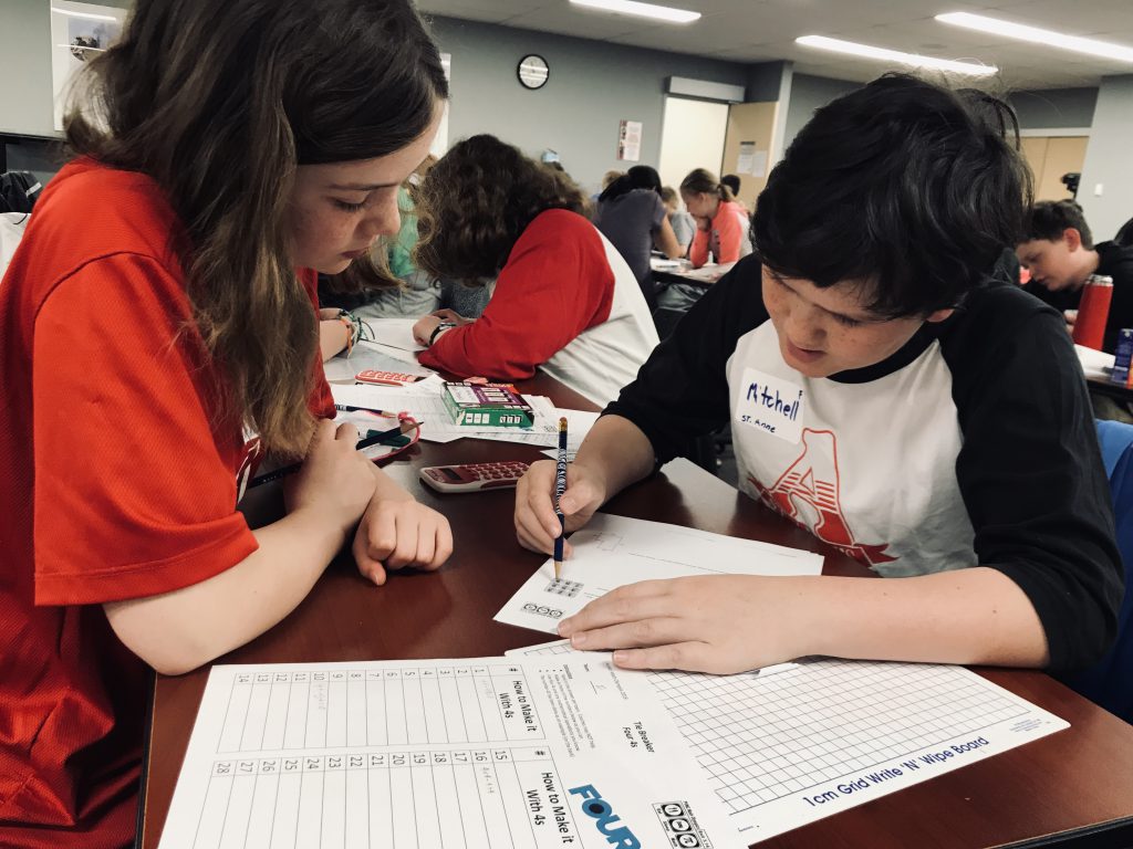 students working during math competition