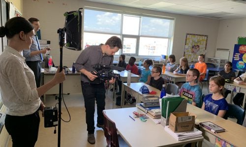 film crew recording in a class