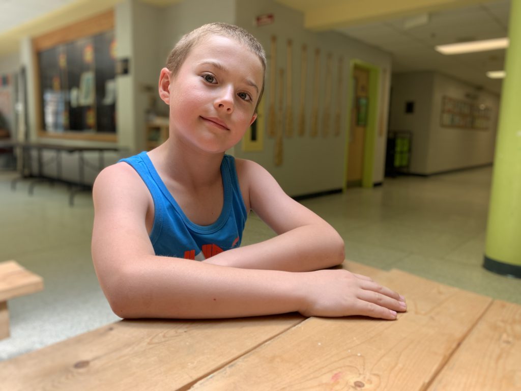 student sitting at table