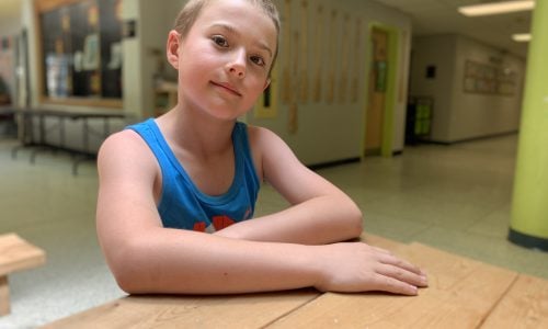 student sitting at table