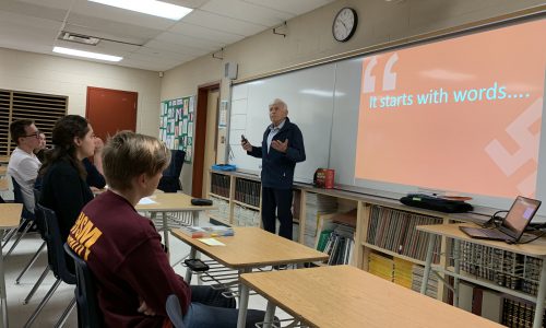 students listening to quest speaker