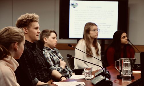 student in meeting