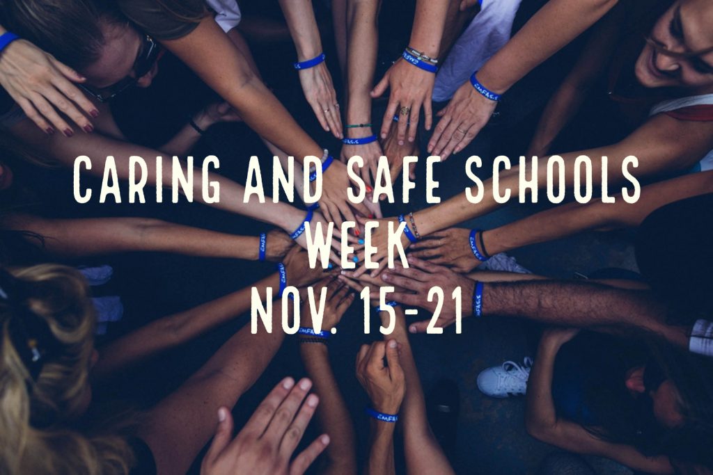 Image conveys outstretched hands in an embrace as a symbol of Caring and Safe Schools Week