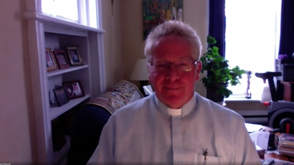 A Screen Grab of Board Chaplain Fr. Paul Massel