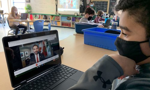 Students view a computer screen
