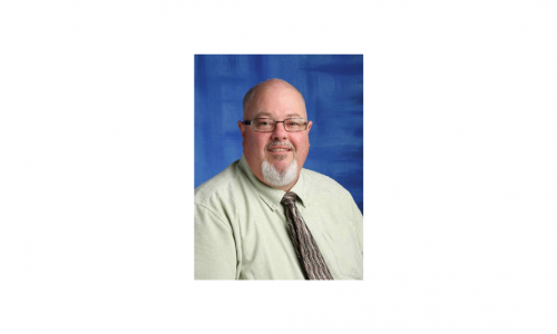 Staff photograph of principal Gerard van den Wildenberg