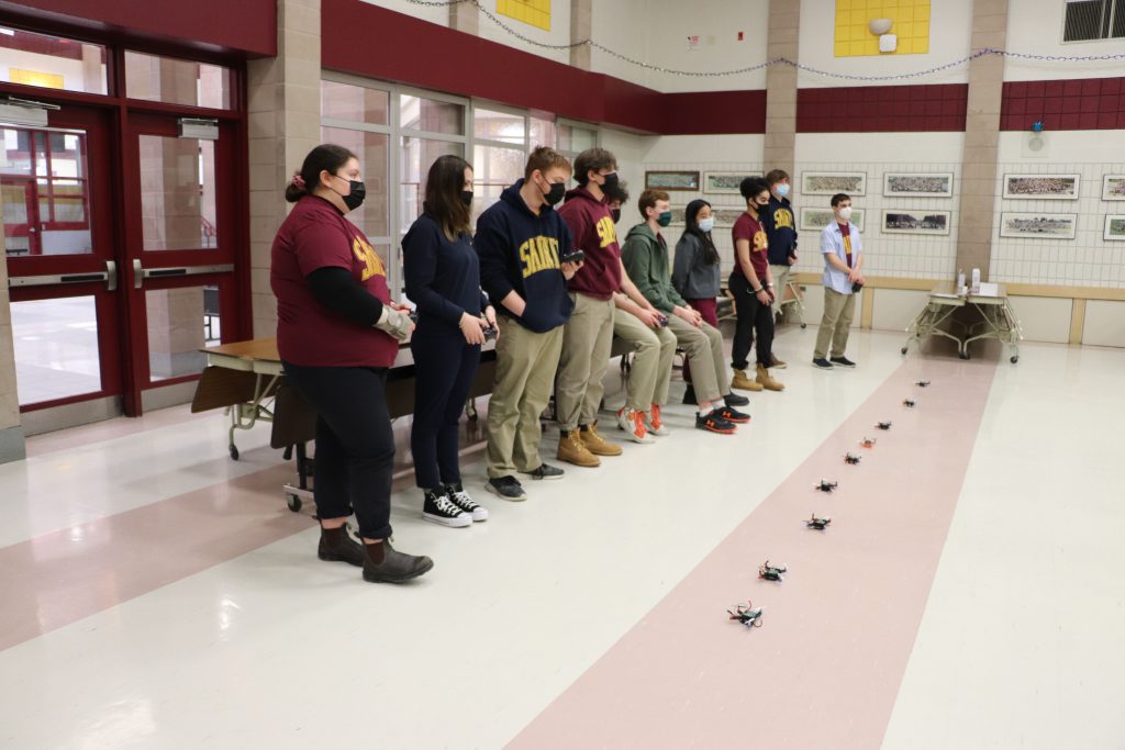 students at st.peter css with drones