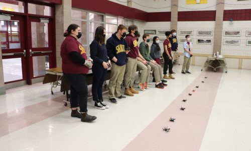 students at st.peter css with drones