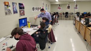teacher andrew clark demonstrating 