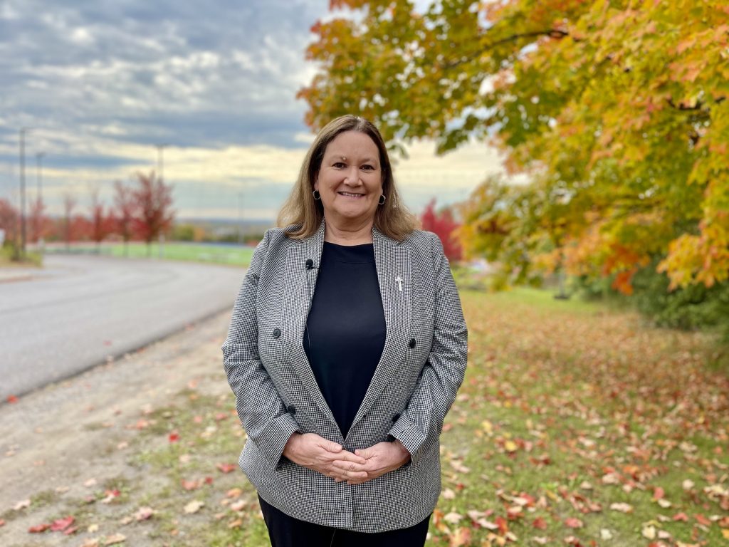 Profile of Director of Education Joan Carragher with autumn background