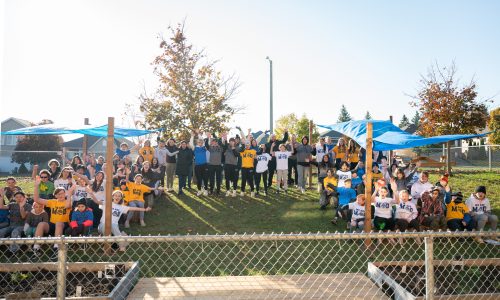 Group photo of student from MOD in new outdoor classroom.