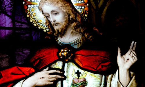 A stained glass rendering or Christ's Sacred Heart