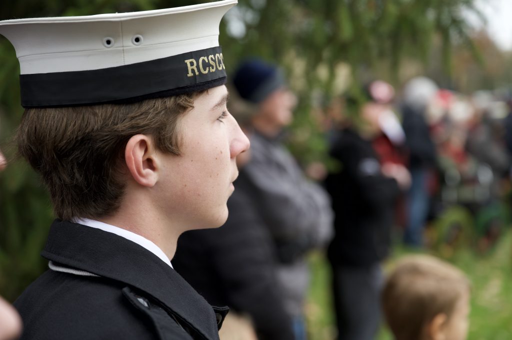 Cadet looks on at a Remembrance Day ceremony.