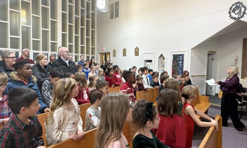 Group of people singing in church