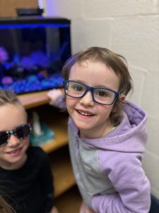 Two students wearing glasses.