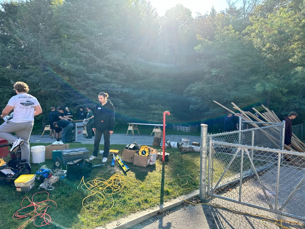 students building a garden in a school yard.