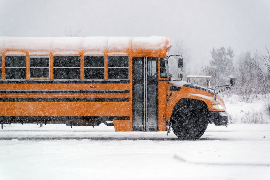 School bus in a snow storm.