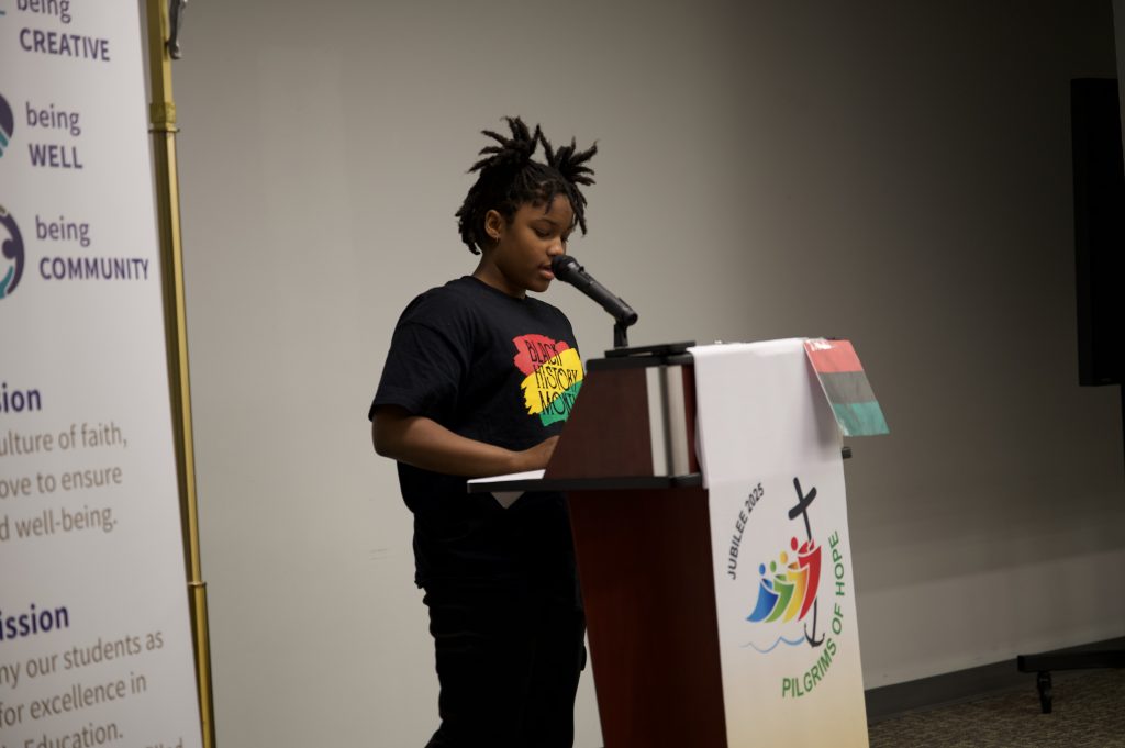 Student at lectern.
