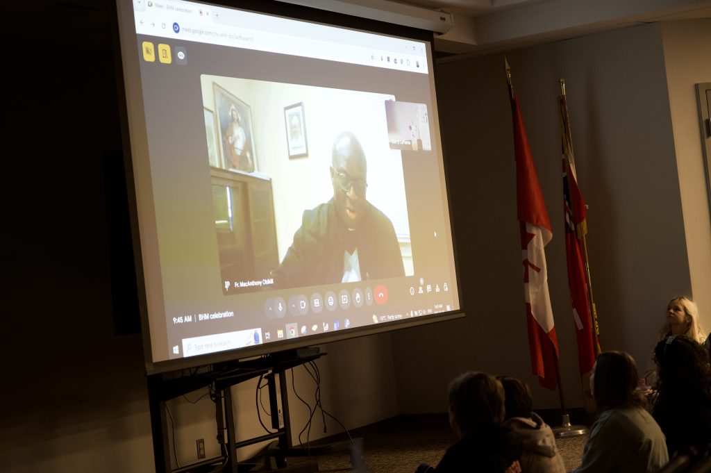 Virtual presentation by priest.