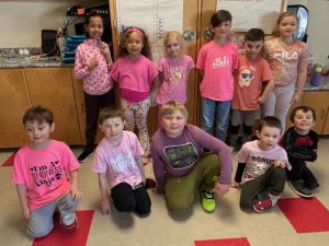 Group of students wearing pink for Pink Shirt Day