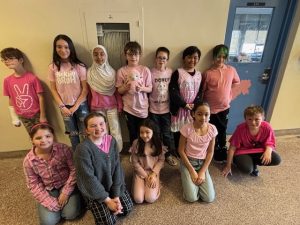 Group of students wearing pink for Pink Shirt Day