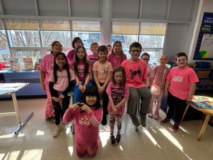 Group of students wearing pink for Pink Shirt Day