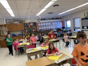 Students in class wearing pink for Pink Shirt Day