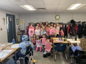 Group of students wearing pink for Pink Shirt Day