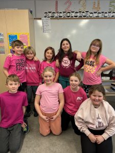 Group of students wearing pink for Pink Shirt Day