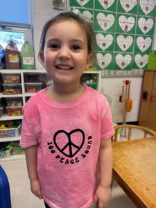 student wearing pink for Pink Shirt Day