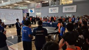 Students compete in a robotics competition.