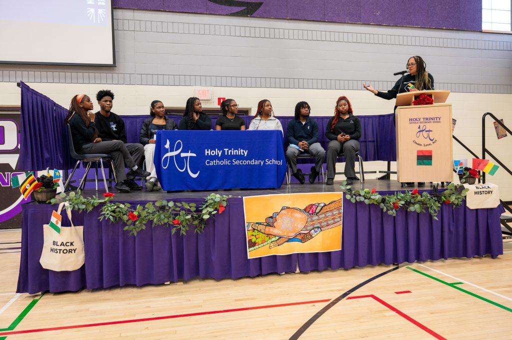 A group of Black students holds a roundtable discussion about Black History Month.