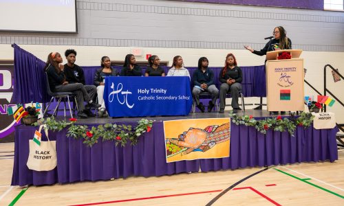 A group of Black students holds a roundtable discussion about Black History Month.