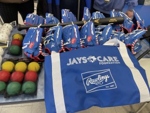 Baseball equipment including gloves, balls and bags.