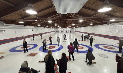A group of new Canadians tries the sport of curling for the first time.